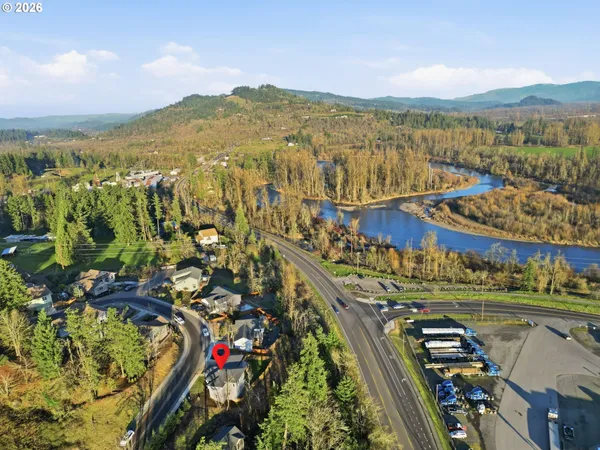 an aerial view of houses with outdoor space