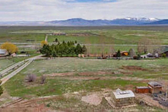 a view of a lake with a yard