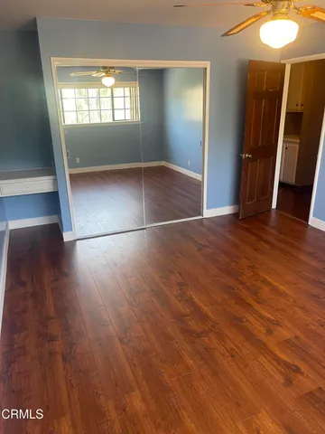 a view of storage and utility room with washer and dryer