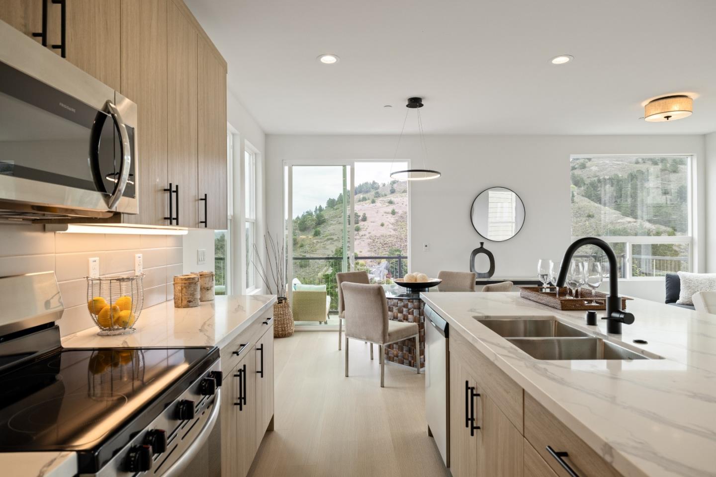823 Fassler, Unit 823 Pacifica, CA 94044 - Photo 11 of 37 a kitchen with a sink appliances and cabinets