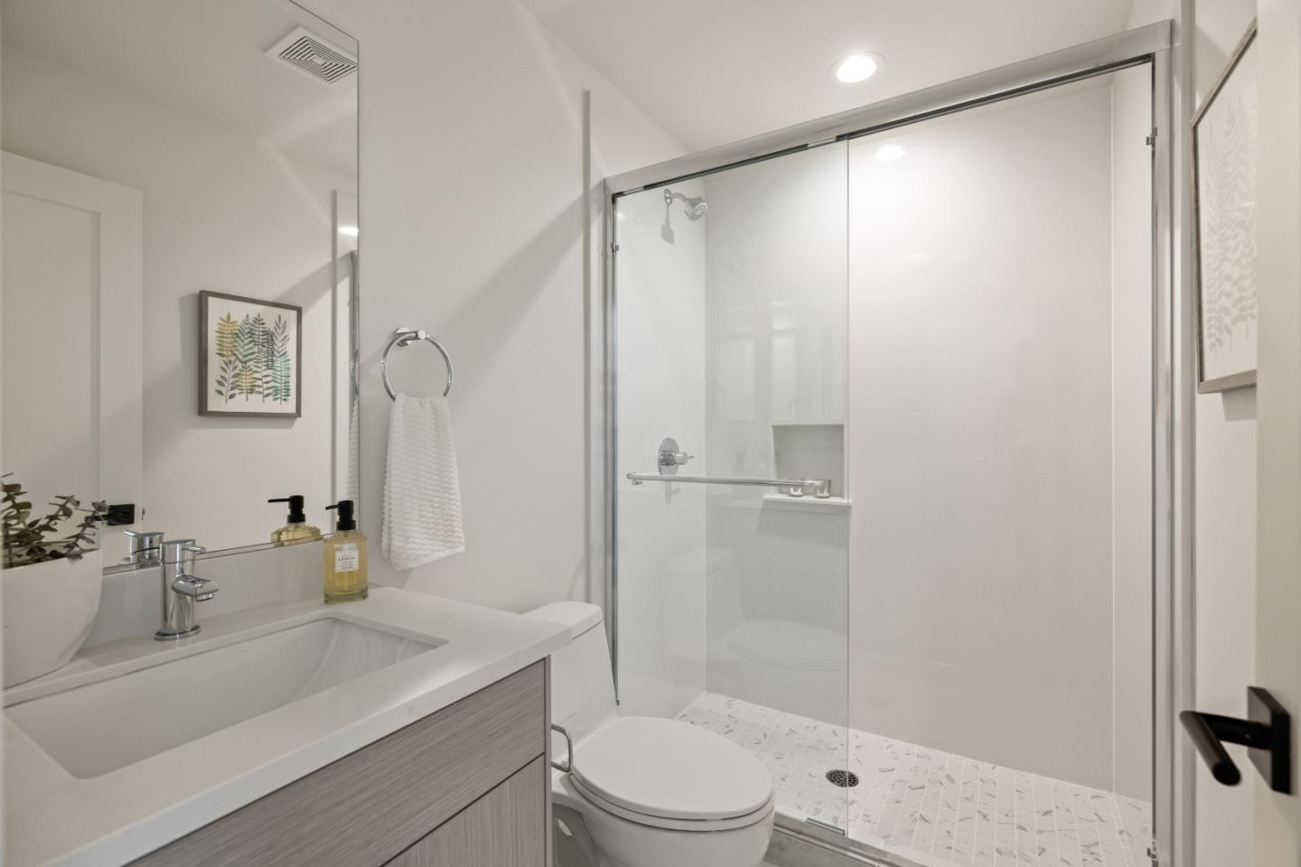 823 Fassler, Unit 823 Pacifica, CA 94044 - Photo 17 of 37 a bathroom with a sink a toilet and shower