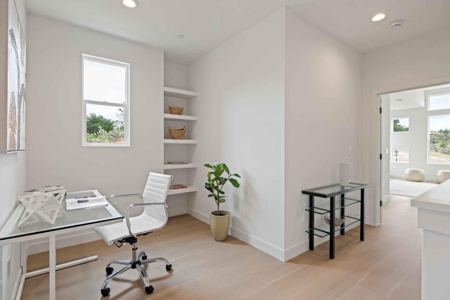 823 Fassler, Unit 823 Pacifica, CA 94044 - Photo 18 of 37 a view of a workspace room with furniture and a window