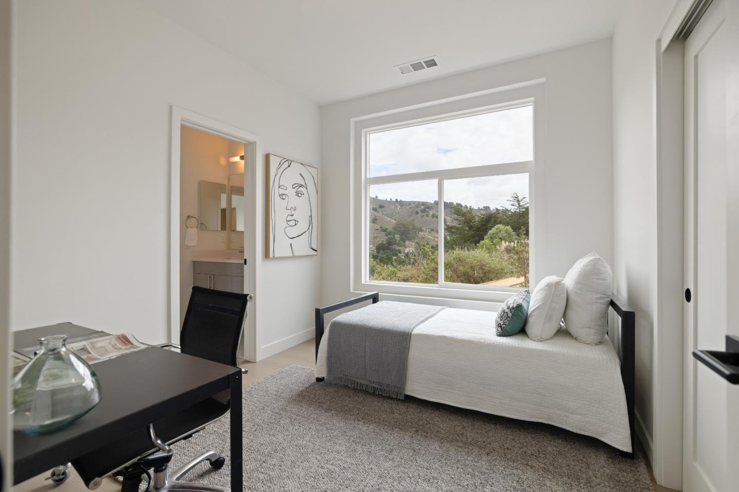 823 Fassler, Unit 823 Pacifica, CA 94044 - Photo 27 of 37 a bedroom with bed and a window