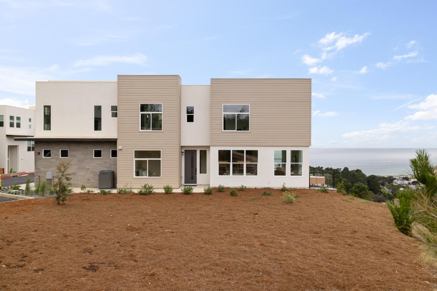 823 Fassler, Unit 823 Pacifica, CA 94044 - Photo 30 of 37 a front view of building with yard