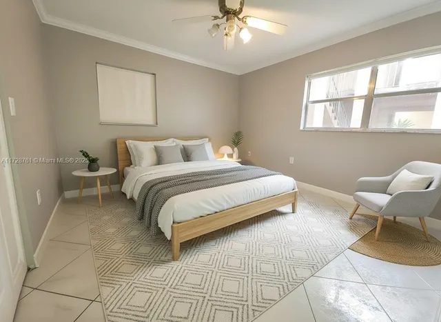 a bedroom with a bed chair and window