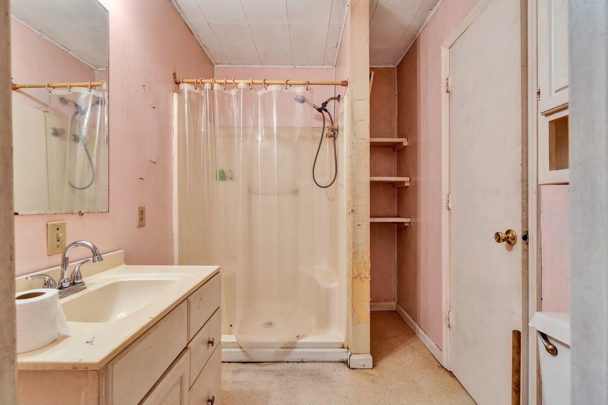 1895 North Hunter Bend Road Decatur, TN 37322 - Photo 11 of 33 a bathroom with a granite countertop sink a shower and a mirror