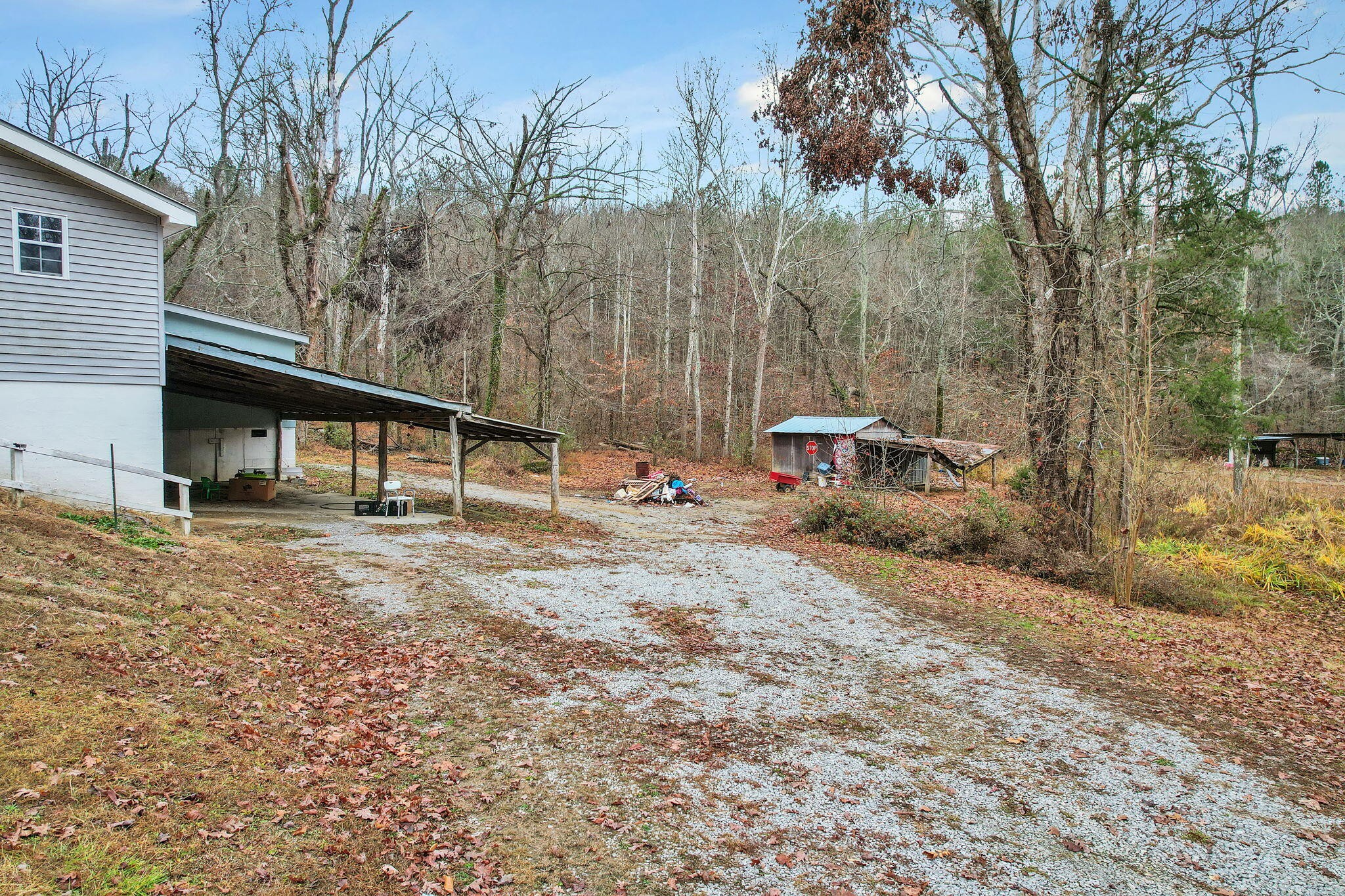 1895 North Hunter Bend Road Decatur, TN 37322 - Photo 24 of 33 a backyard of a house with table and chairs