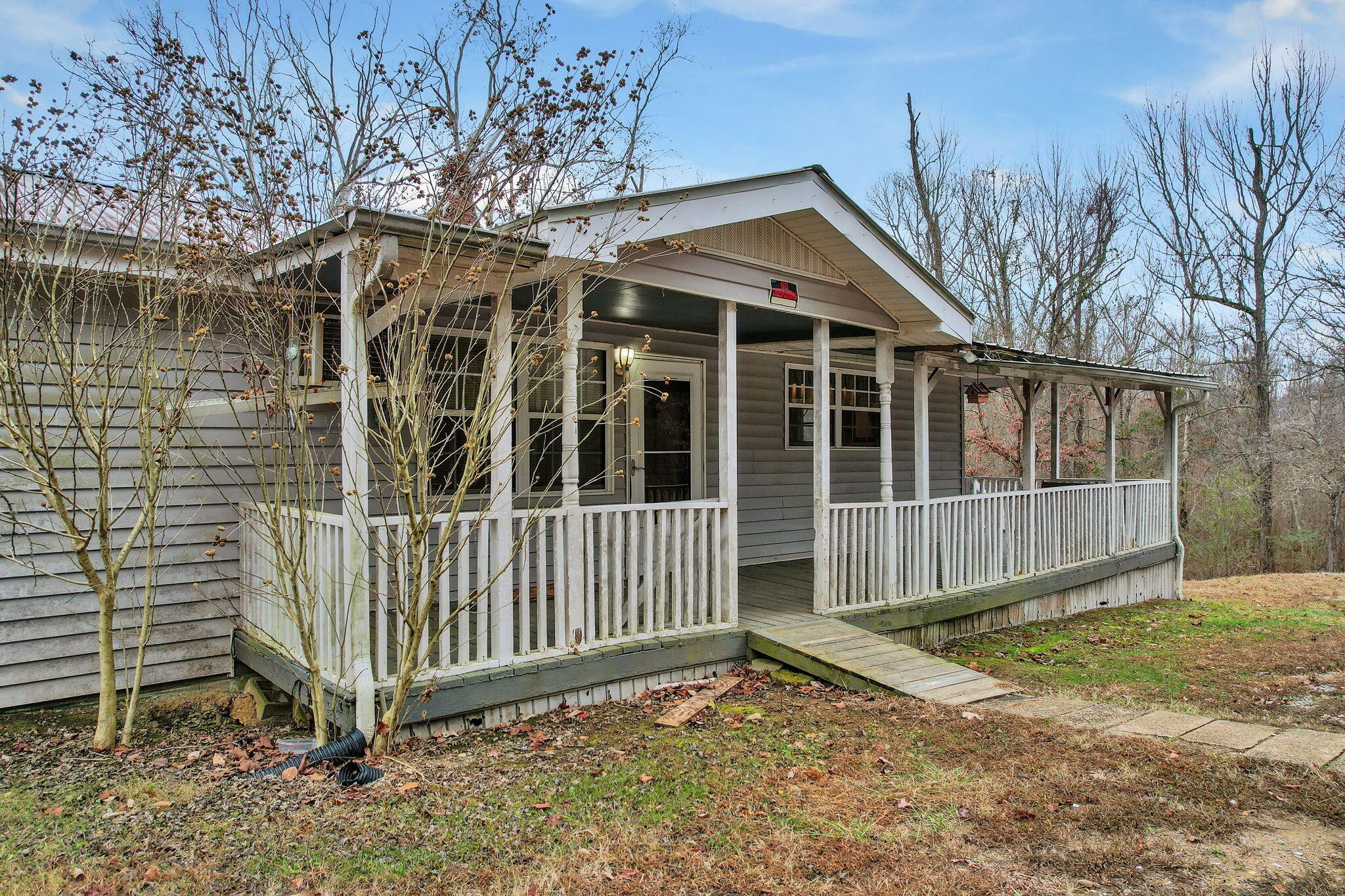 1895 North Hunter Bend Road Decatur, TN 37322 - Photo 26 of 33 a view of a house with a yard and wooden fence