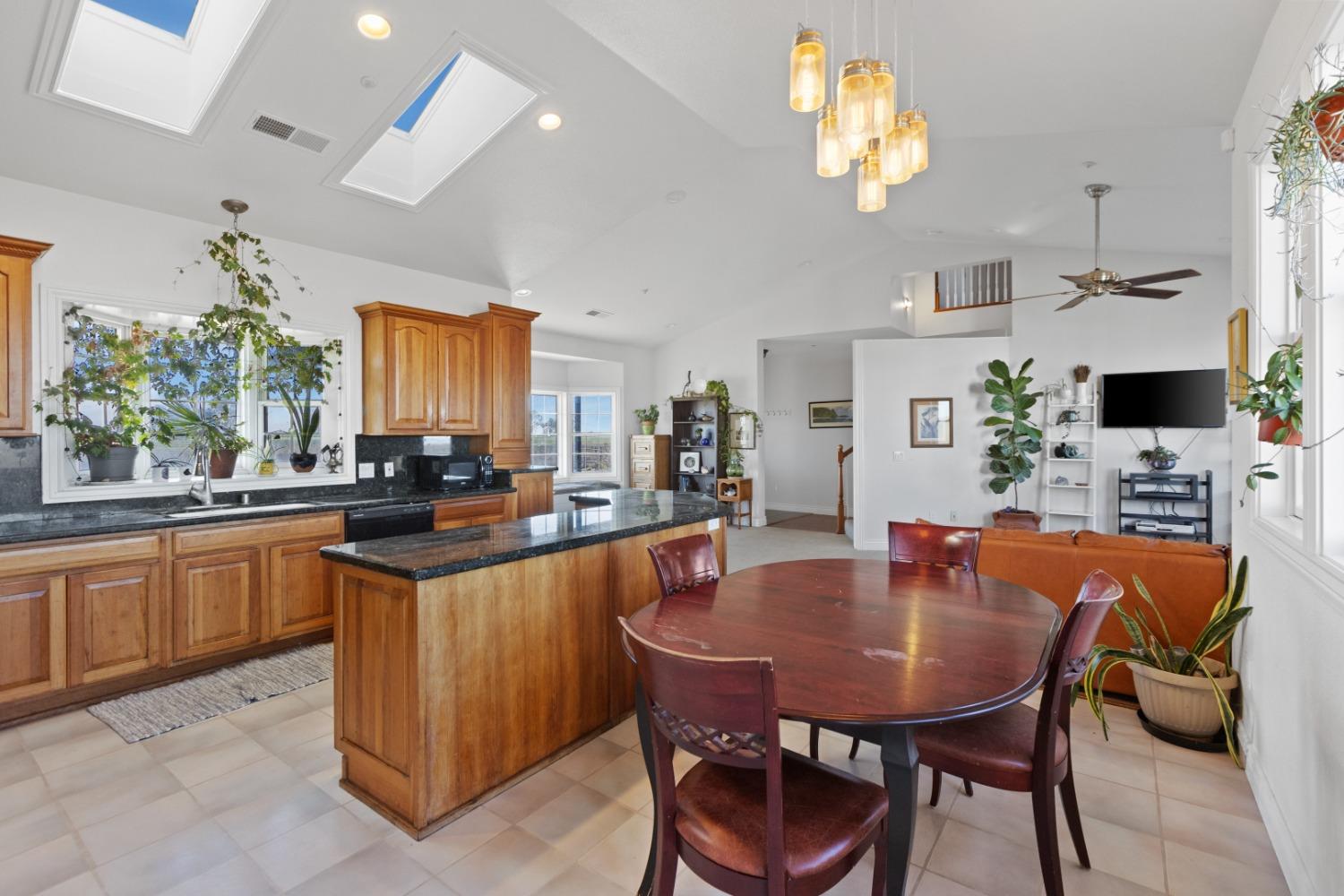 44643 County Road 29 Davis, CA 95618 - Photo 14 of 36 a dining table with chairs and window