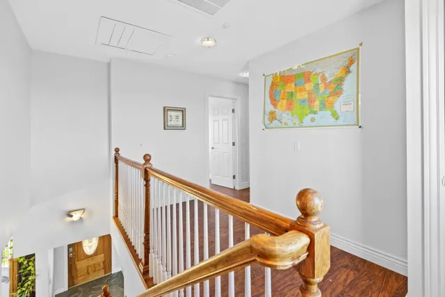 a view of entryway with wooden floor