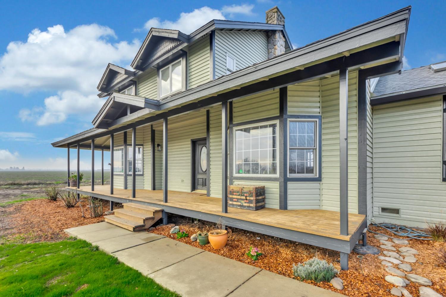 44643 County Road 29 Davis, CA 95618 - Photo 3 of 36 a view of a house with a large windows and a yard