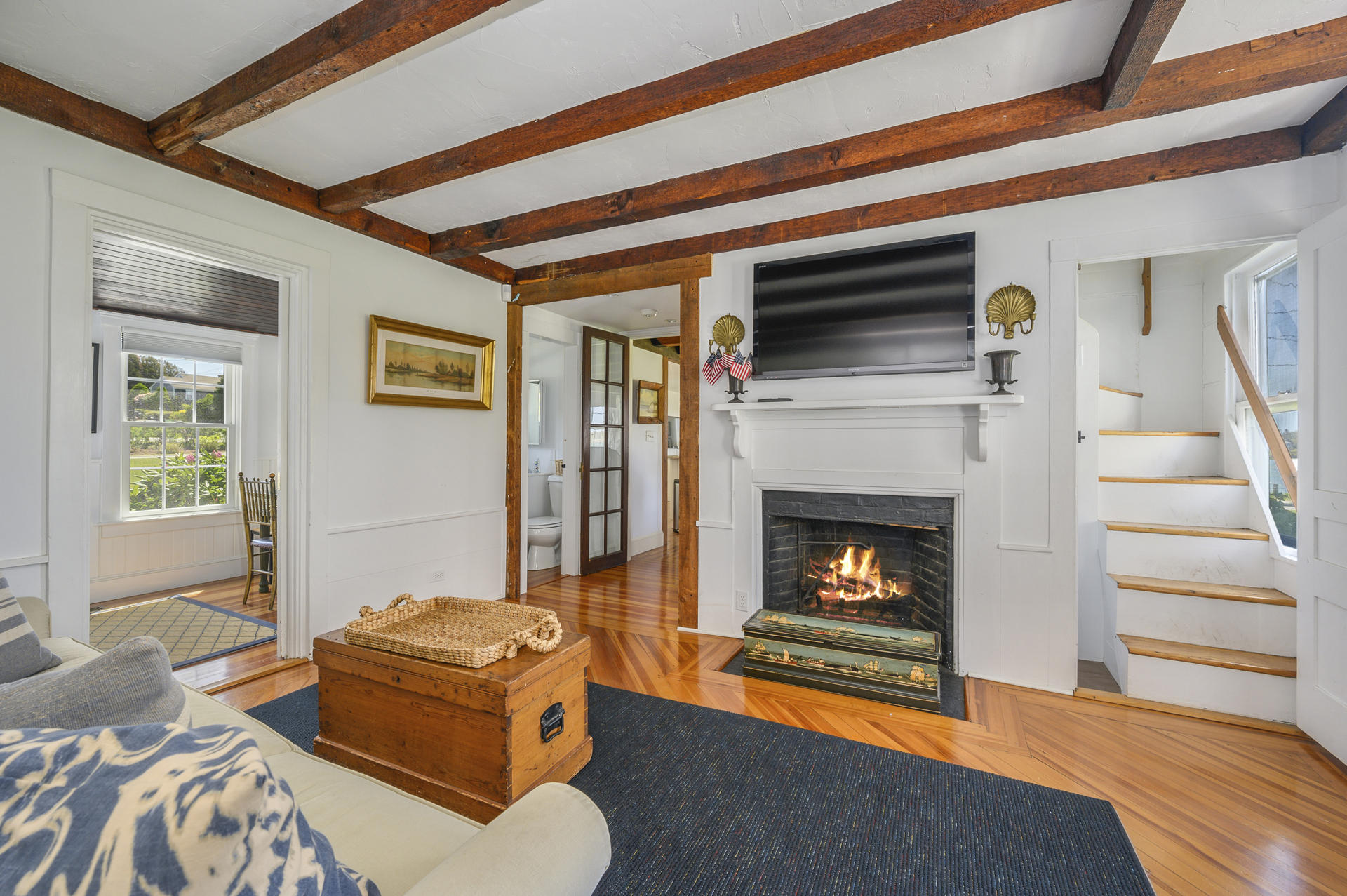 133 Queen Anne Road Chatham, MA 02633 - Photo 15 of 52 a living room with furniture and a fireplace