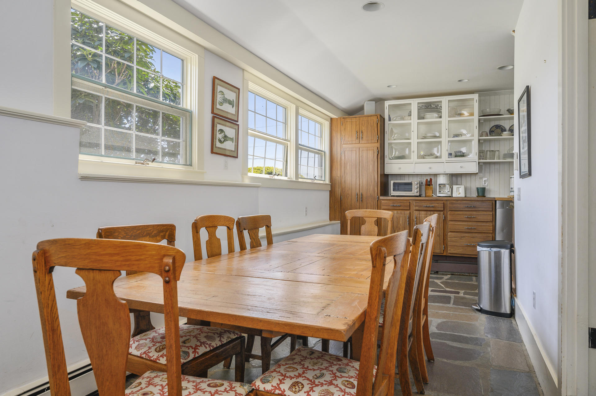 133 Queen Anne Road Chatham, MA 02633 - Photo 18 of 52 a view of a dining room with furniture and window
