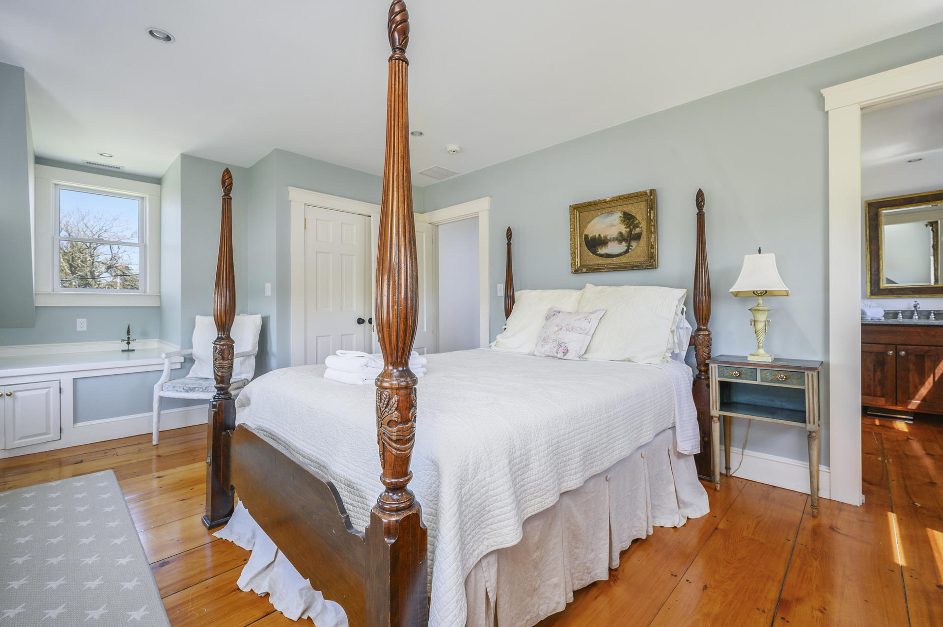 133 Queen Anne Road Chatham, MA 02633 - Photo 21 of 52 a bedroom with bed and a table