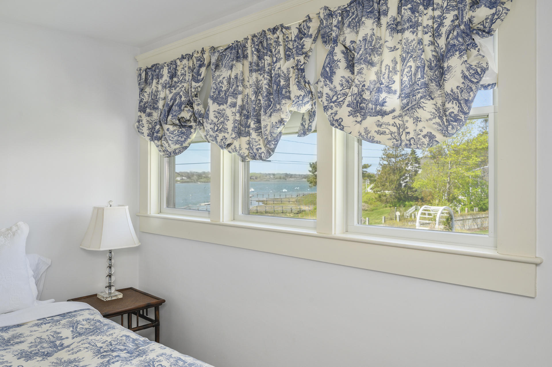 133 Queen Anne Road Chatham, MA 02633 - Photo 23 of 52 a very nice looking room with a large window and a chandelier