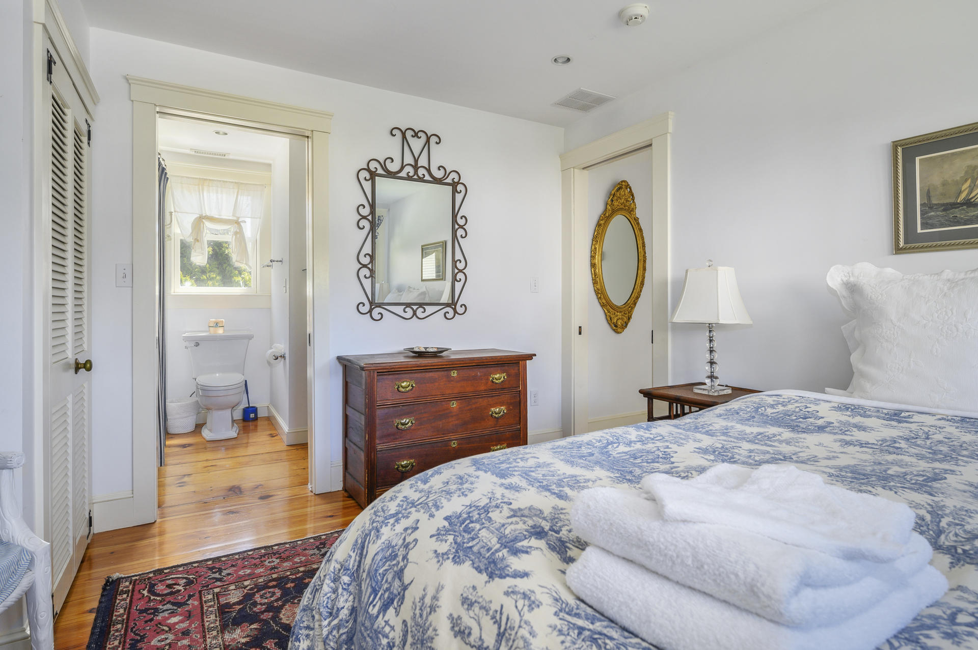 133 Queen Anne Road Chatham, MA 02633 - Photo 24 of 52 a bedroom with a bed and a dresser