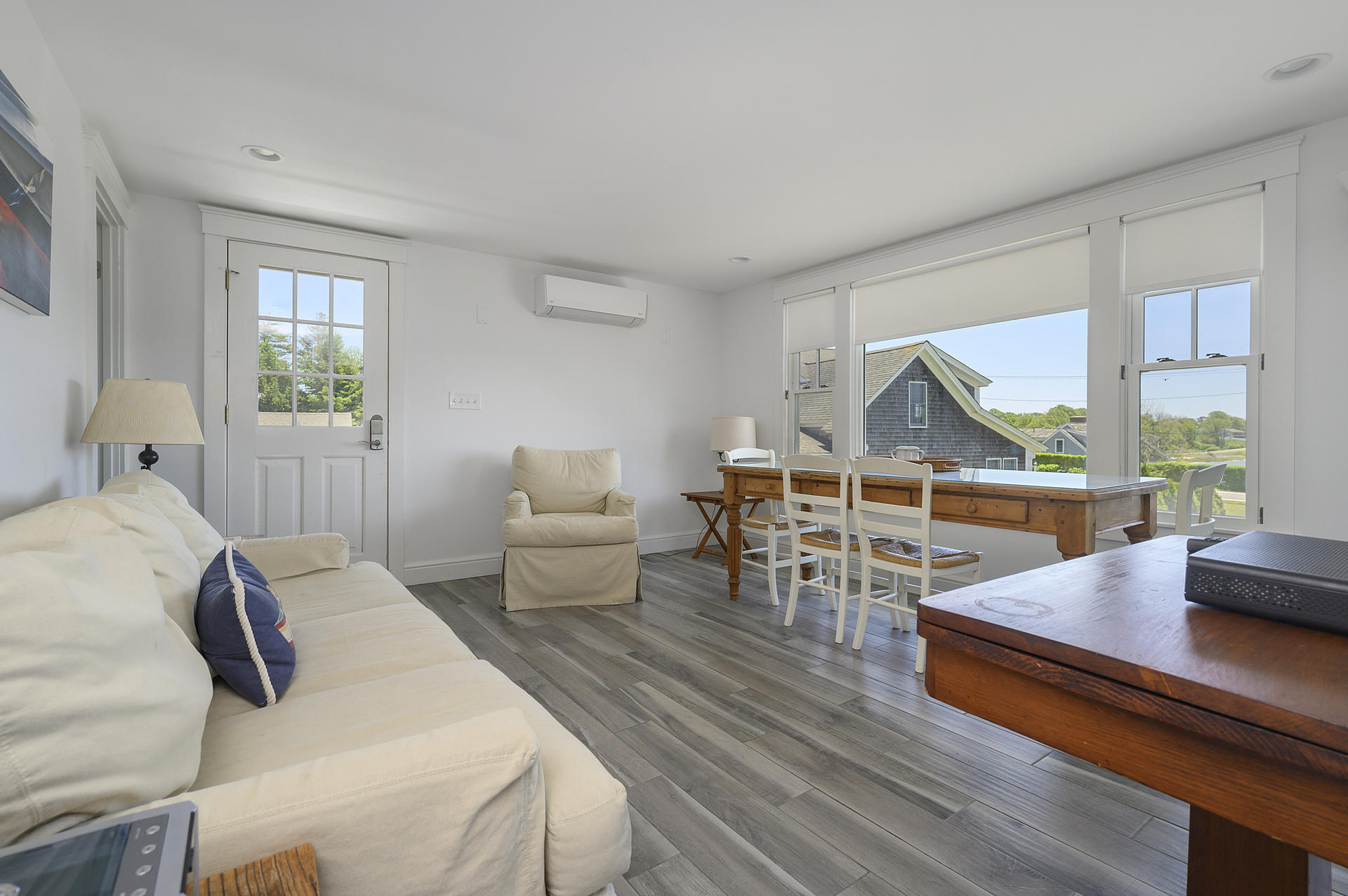 133 Queen Anne Road Chatham, MA 02633 - Photo 30 of 52 a living room with furniture and a large window