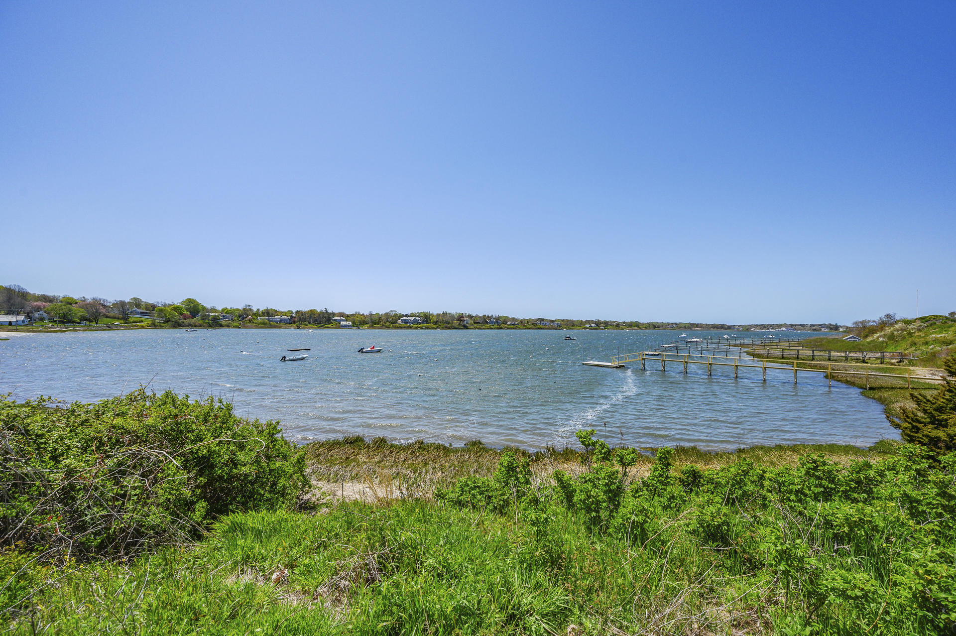133 Queen Anne Road Chatham, MA 02633 - Photo 44 of 52 a view of a lake with a yard