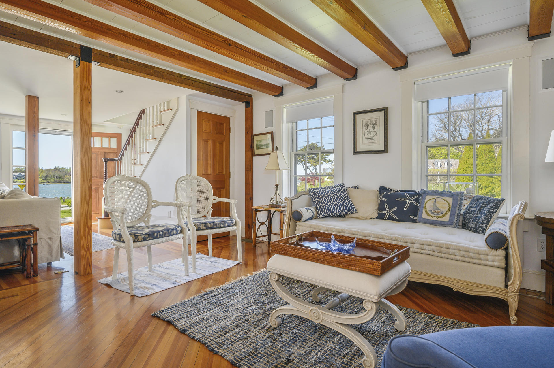 133 Queen Anne Road Chatham, MA 02633 - Photo 9 of 52 a living room with furniture and a table
