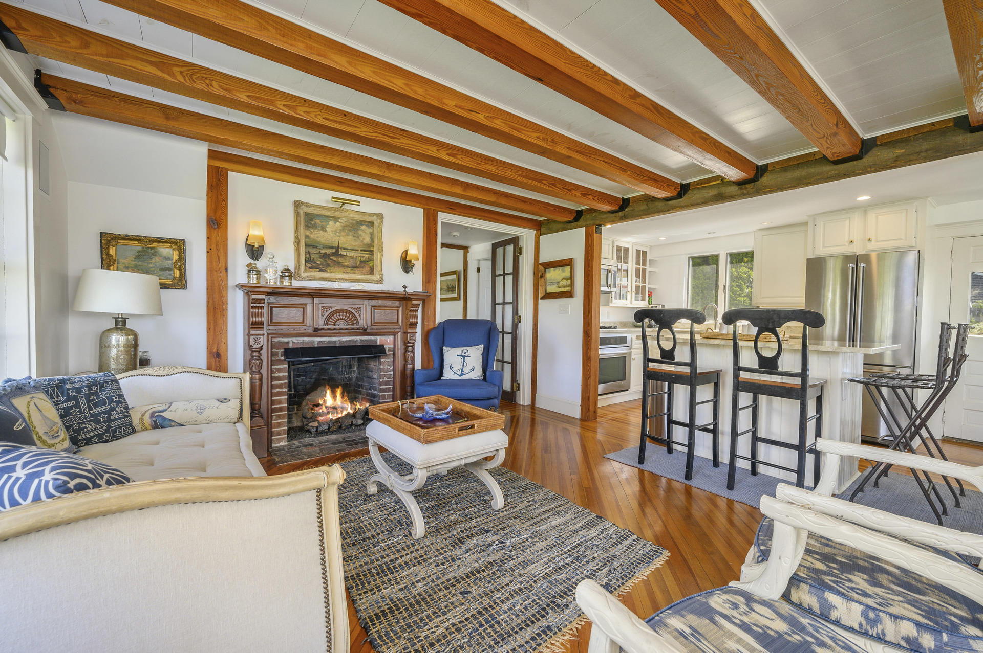 133 Queen Anne Road Chatham, MA 02633 - Photo 10 of 52 a living room with furniture and a fireplace