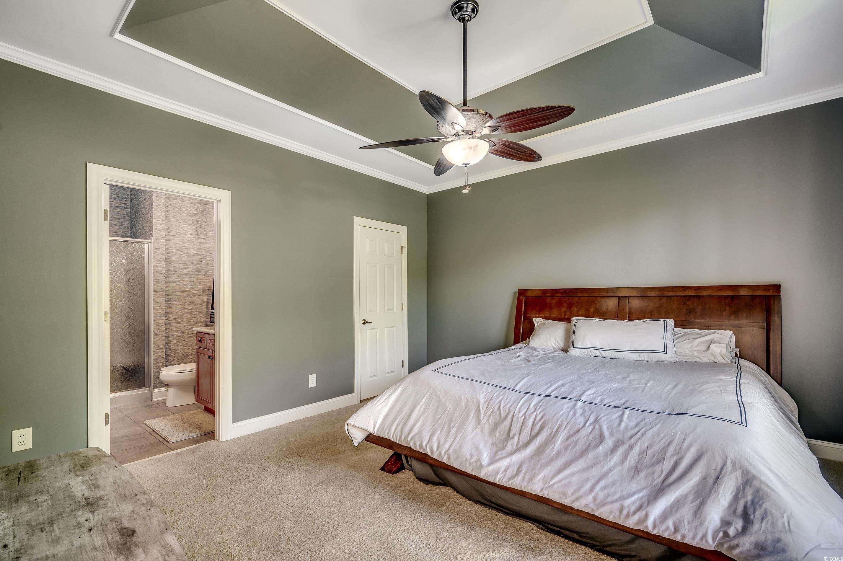 109 Pheasant Run Drive Murrells Inlet, SC 29576 - Photo 16 of 31 Bedroom featuring crown molding, connected bathroo