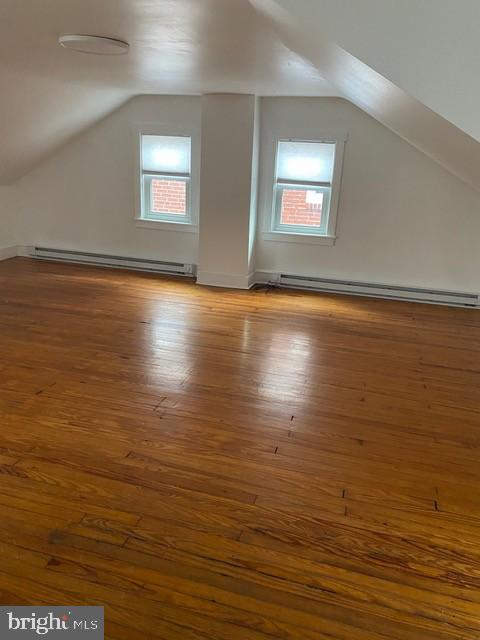 112 North Miller Street, Unit 2 Reading, PA 19607 - Photo 14 of 24 an empty room with wooden floor and windows