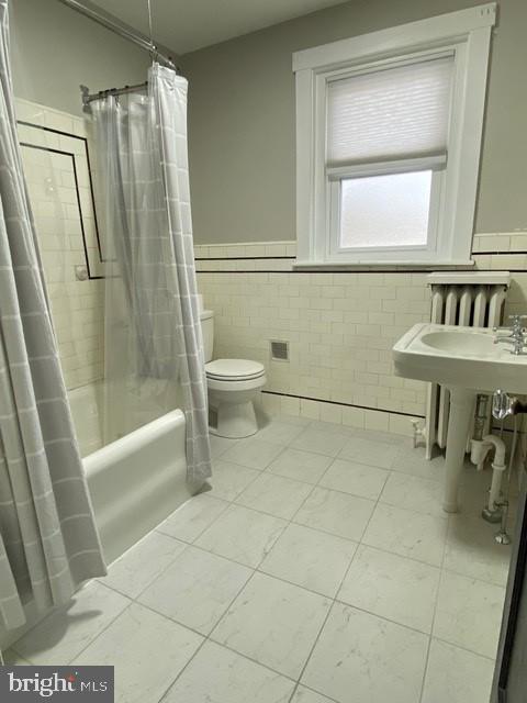 112 North Miller Street, Unit 2 Reading, PA 19607 - Photo 18 of 24 a bathroom with a shower a toilet and a sink