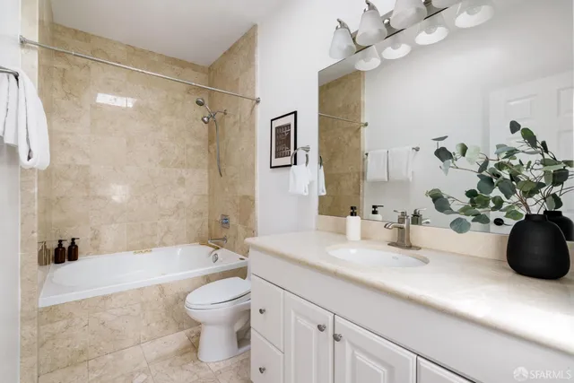 a view of a chairs and table on the deck