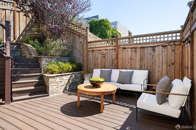 a view of a roof deck with couches