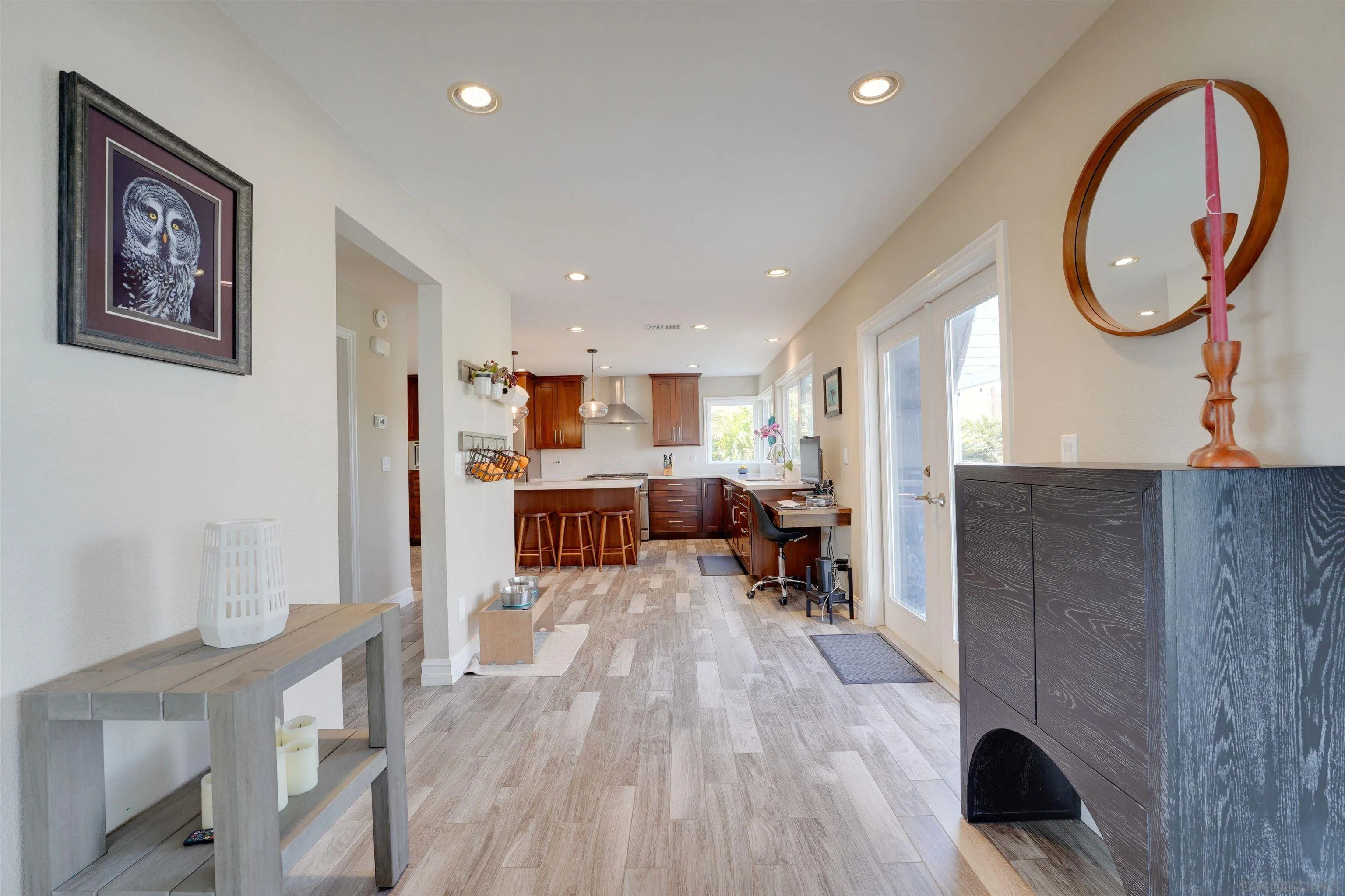 1647 Hawk View Drive Encinitas, CA 92024 - Photo 11 of 73 a living room with furniture and a wooden floor