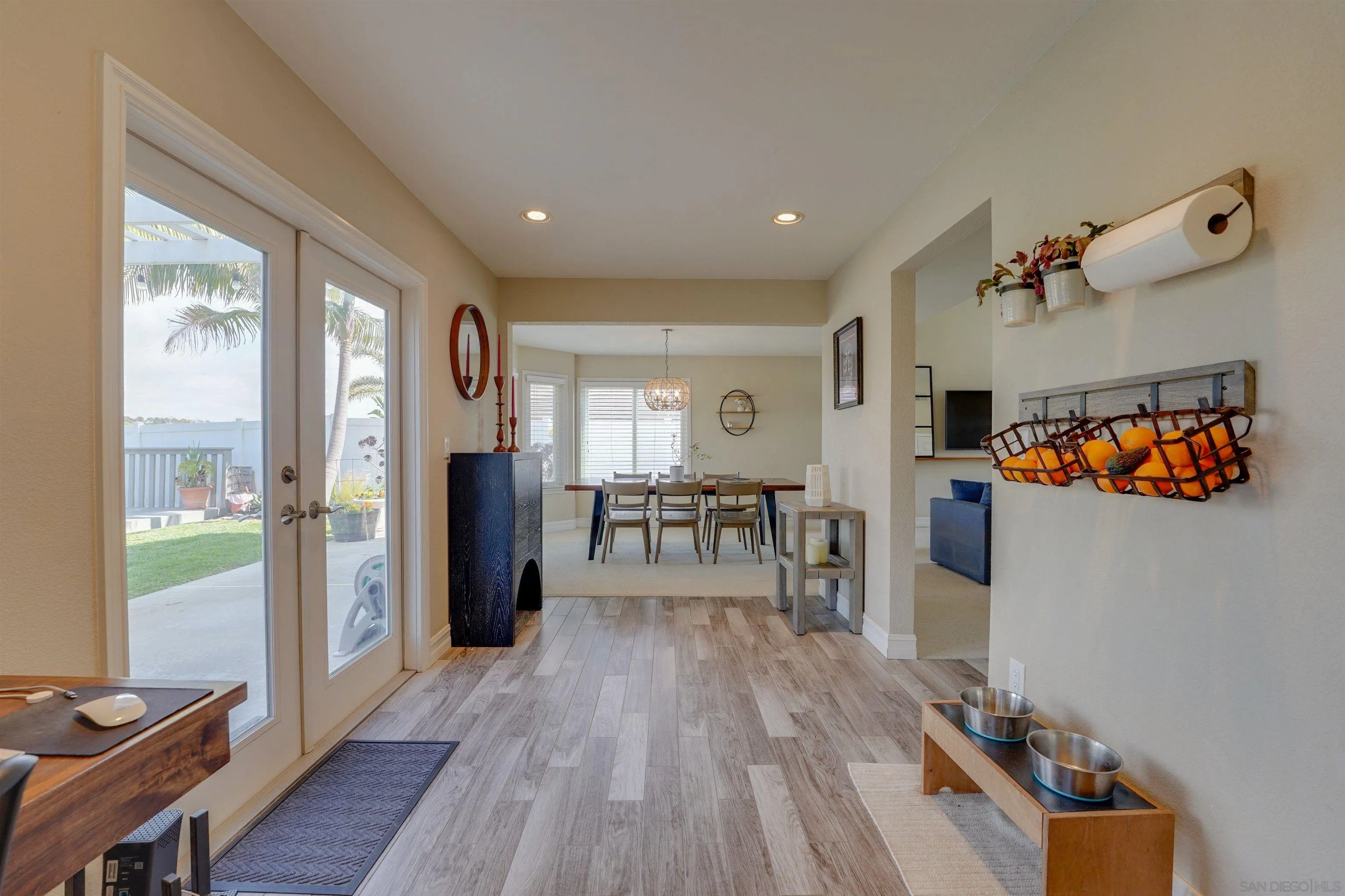 1647 Hawk View Drive Encinitas, CA 92024 - Photo 13 of 73 a very nice looking room with wooden floor and furniture