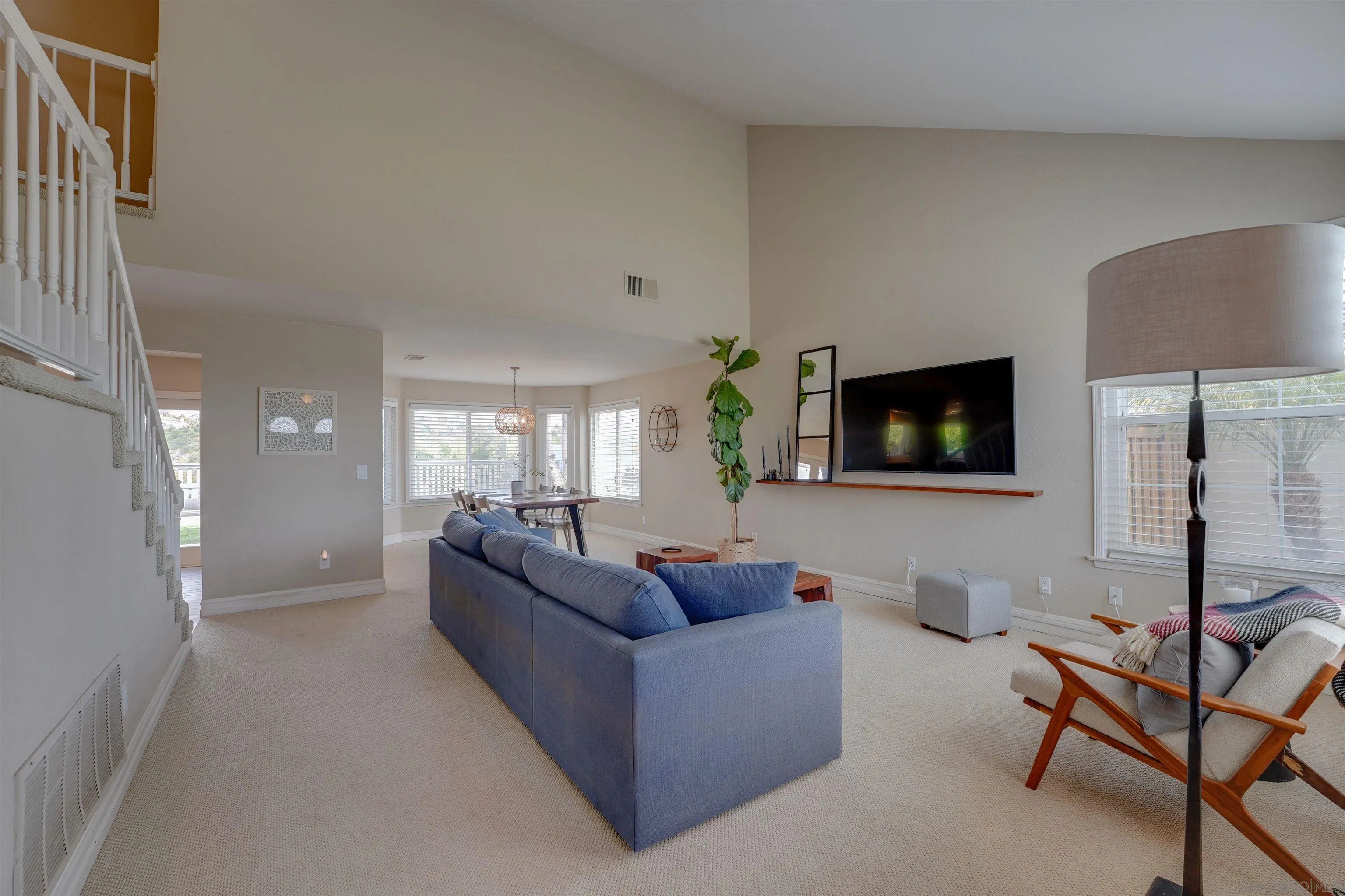 1647 Hawk View Drive Encinitas, CA 92024 - Photo 3 of 73 a living room with furniture and a flat screen tv