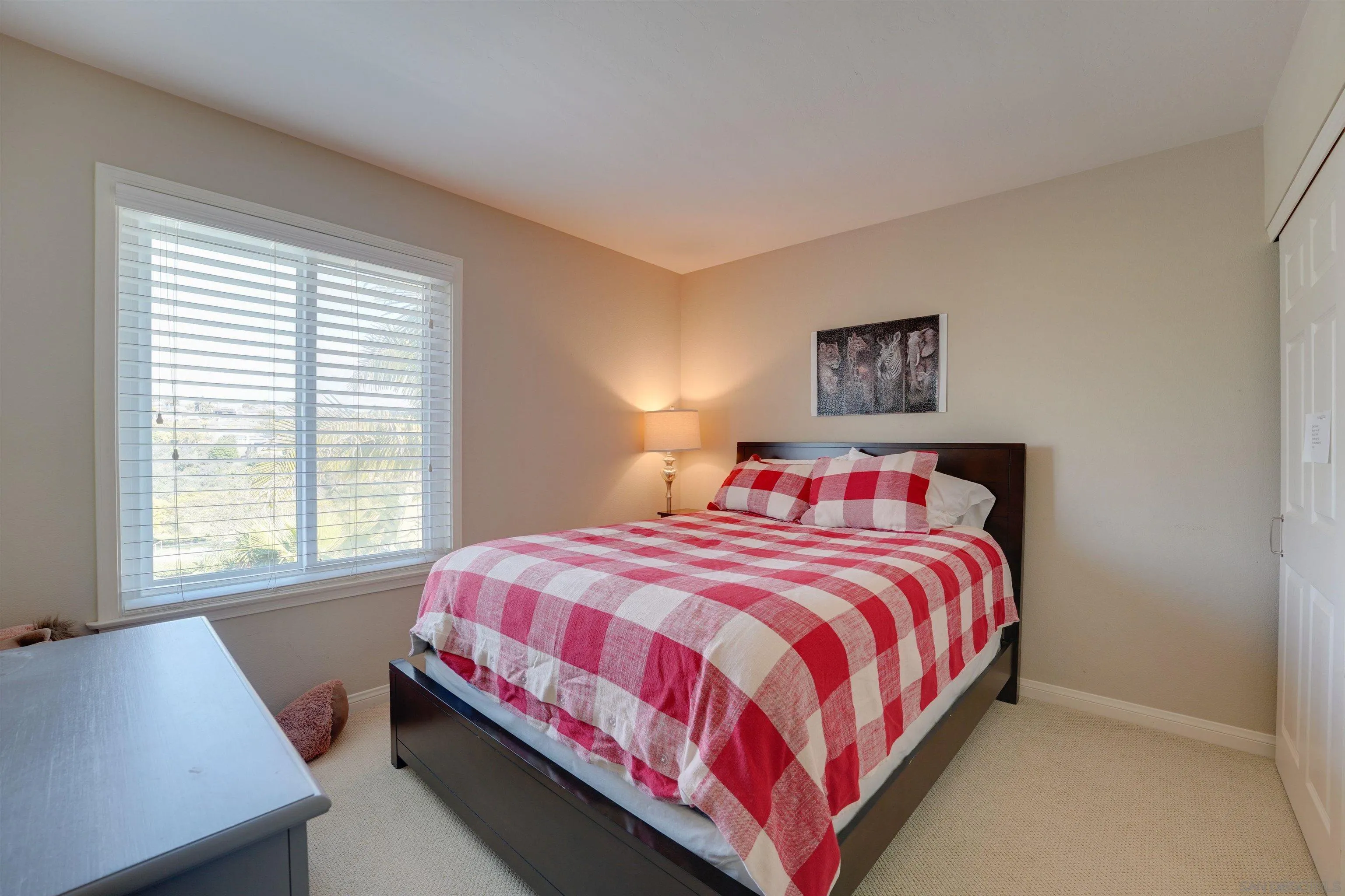 1647 Hawk View Drive Encinitas, CA 92024 - Photo 33 of 73 a bedroom with a bed and a night stand