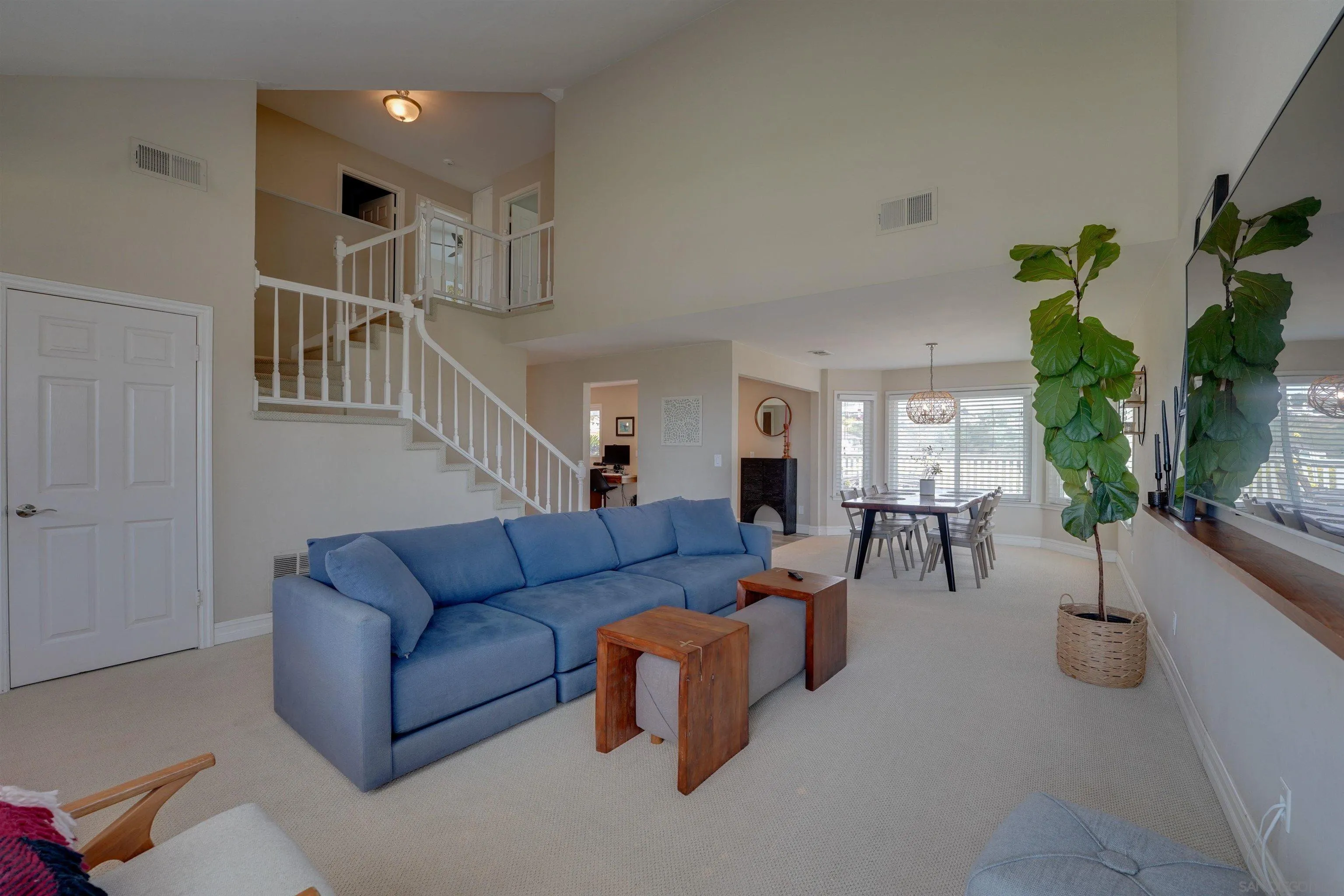 1647 Hawk View Drive Encinitas, CA 92024 - Photo 4 of 73 a living room with furniture and a potted plant