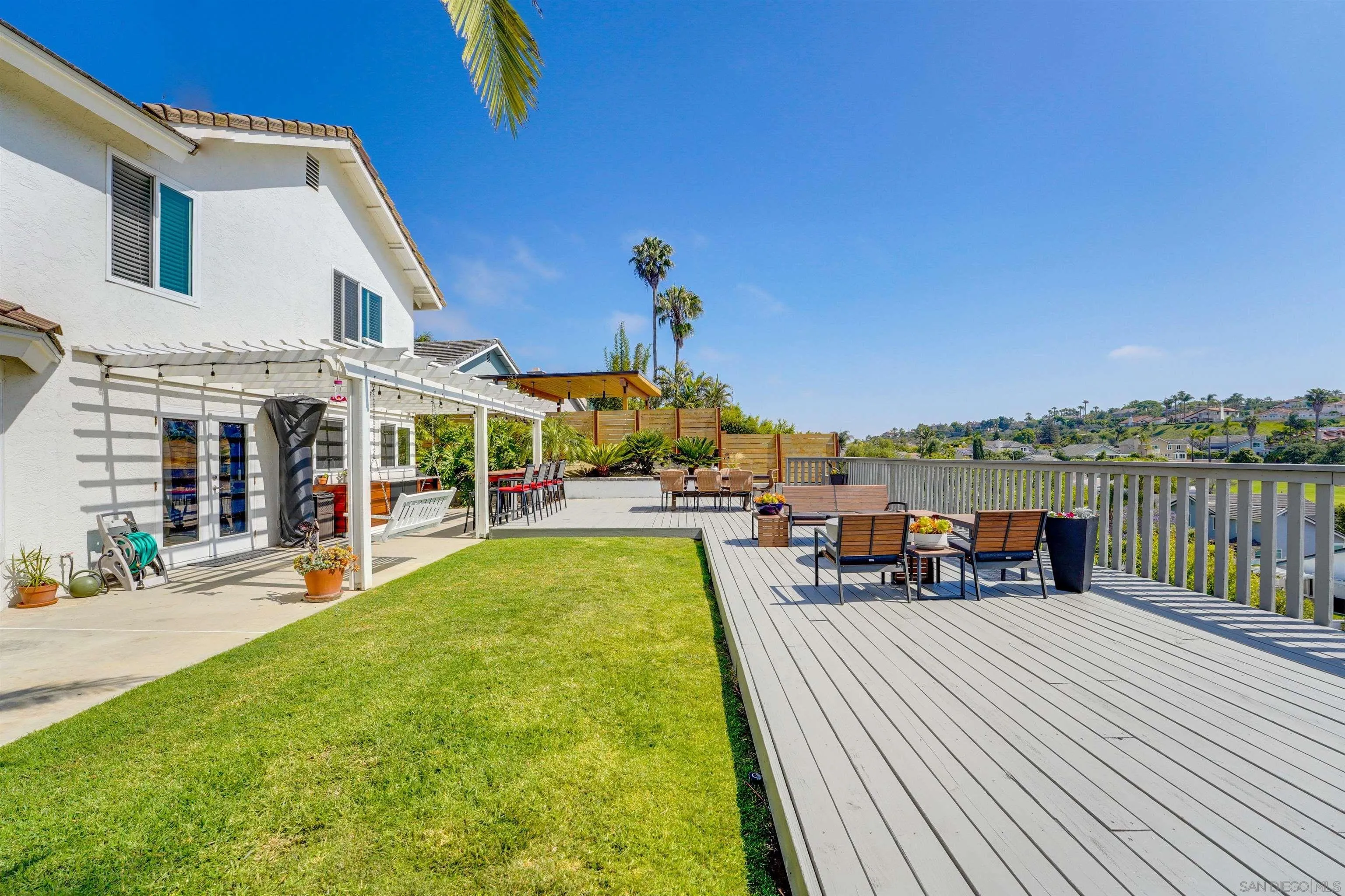1647 Hawk View Drive Encinitas, CA 92024 - Photo 46 of 73 a view of a house with swimming pool and sitting area