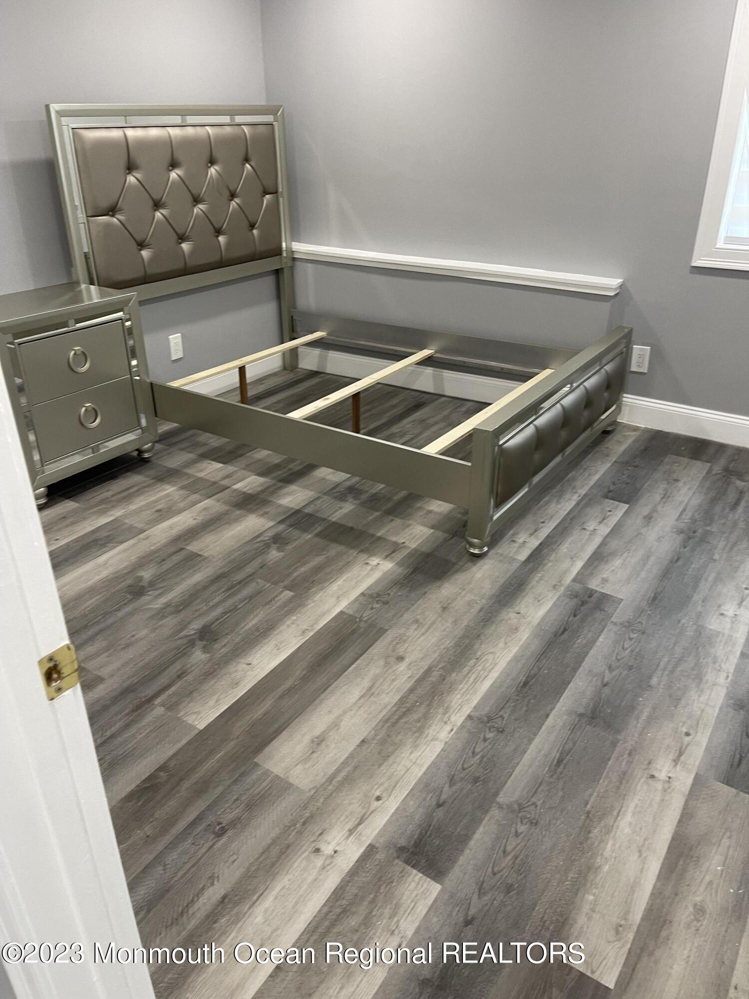 6 Dwight Drive Asbury Park, NJ 07712 - Photo 10 of 16 a living room with a couch