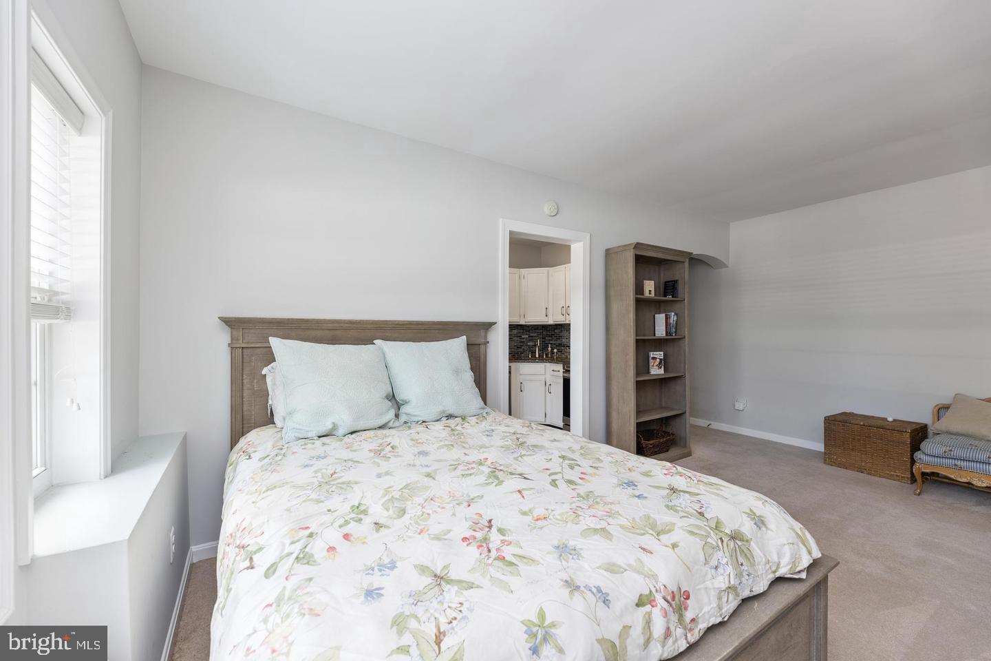 1902 North Rhodes Street, Unit 66 Arlington, VA 22201 - Photo 12 of 28 a bedroom with a bed and a closet