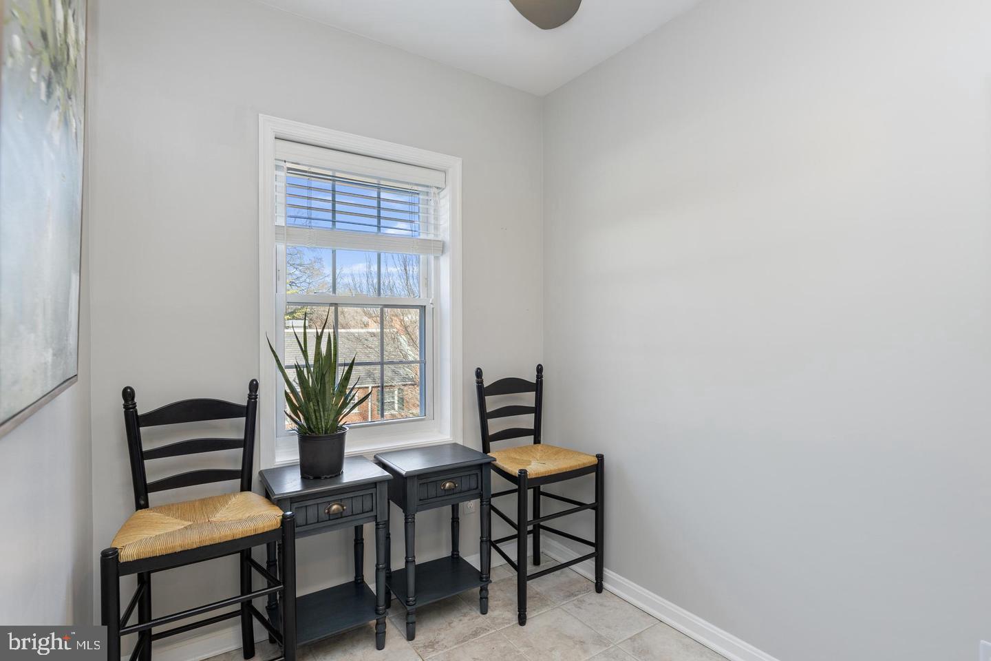 1902 North Rhodes Street, Unit 66 Arlington, VA 22201 - Photo 8 of 28 a dining room with furniture and window