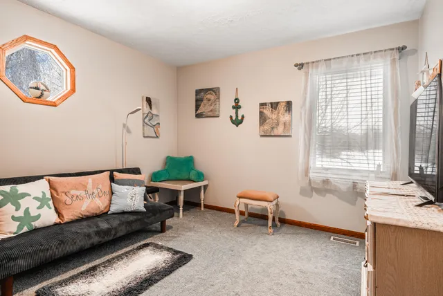 $449,900 | 9073 Wabasis Shores Drive Northeast, Greenville, MI 48838