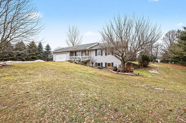 $449,900 | 9073 Wabasis Shores Drive Northeast, Greenville, MI 48838