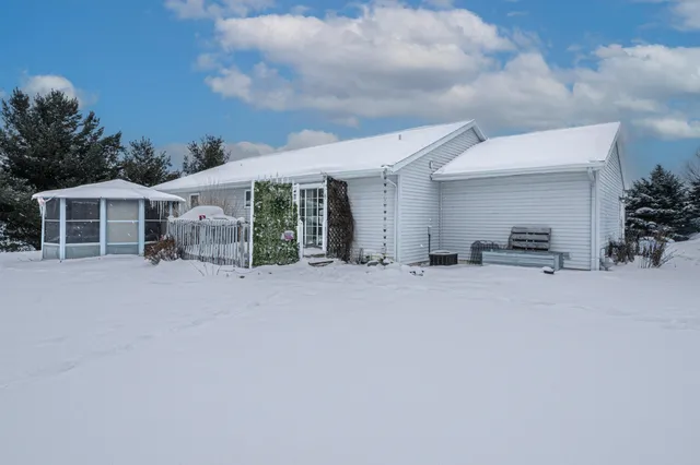 $449,900 | 9073 Wabasis Shores Drive Northeast, Greenville, MI 48838