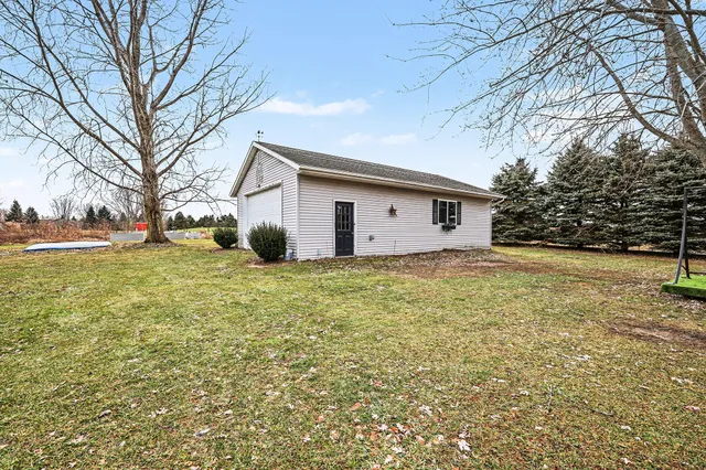 $449,900 | 9073 Wabasis Shores Drive Northeast, Greenville, MI 48838