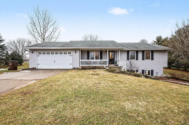 $449,900 | 9073 Wabasis Shores Drive Northeast, Greenville, MI 48838