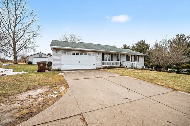 $449,900 | 9073 Wabasis Shores Drive Northeast, Greenville, MI 48838