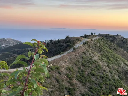 a view of lake and mountain