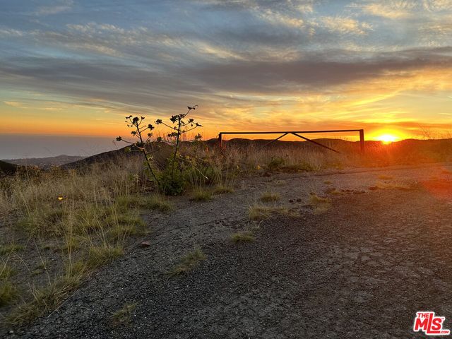 a view of a houses with a yard