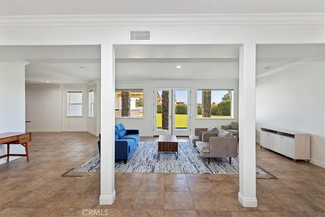 a living room with furniture and a table