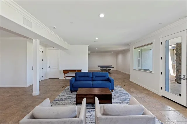 a living room with furniture and a couch