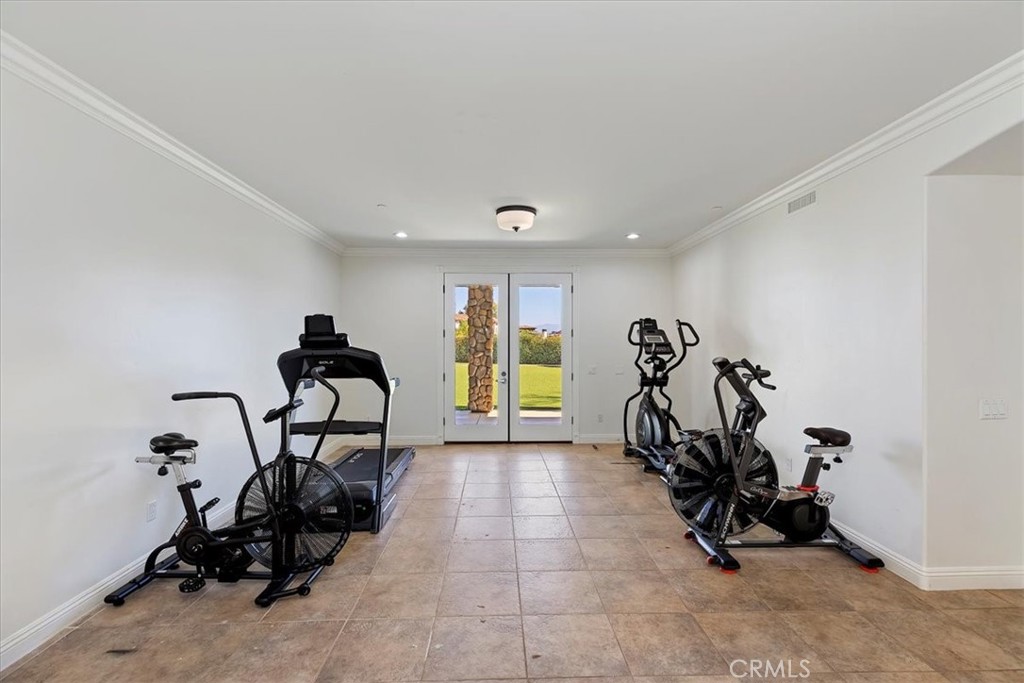 39650 Patagonia Court Temecula, CA 92591 - Photo 17 of 55 a view of a room with gym equipment