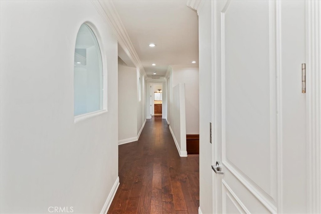 39650 Patagonia Court Temecula, CA 92591 - Photo 19 of 55 a view of a hallway with wooden floor